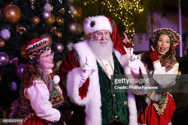 Santa and his Elves attend the Los Angeles Union Station Tree Lighting Ceremony at Union Station on November 20, 2023 in Los Angeles, California.