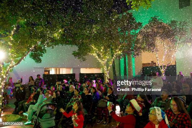 View of snow flurries above attendees during the Los Angeles Union Station Tree Lighting Ceremony at Union Station on November 20, 2023 in Los...