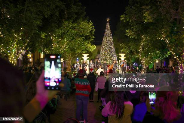 Mariachi Los Servidores with LAPD perform onstage during the Los Angeles Union Station Tree Lighting Ceremony at Union Station on November 20, 2023...