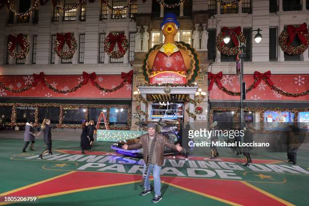 Roger Bart and cast perform "Back to the Future: The Musical" during day one of 97th Macy's Thanksgiving Day Parade rehearsals at Macy's Herald...