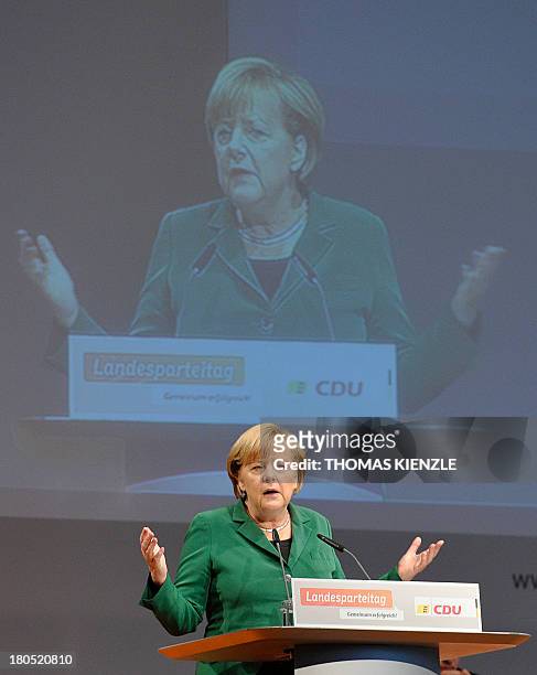 German Chancellor Angela Merkel gives a speech during a regional convention of her Christian Democratic Union party in Heilbronn, southwestern...