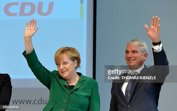 German Chancellor Angela Merkel and Thomas Strobl , regional party chairman of their CDU party in the southern German state of Baden-Wuerttemberg,...