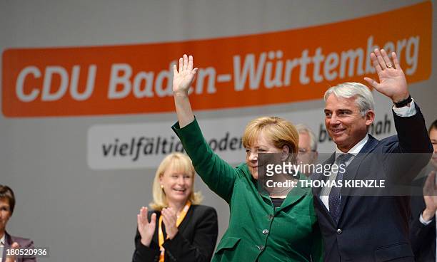 German Chancellor Angela Merkel and Thomas Strobl , regional party chairman of their CDU party in the southern German state of Baden-Wuerttemberg,...