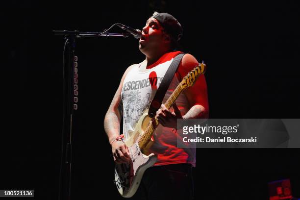 Rome Ramirez of Sublime with Rome performs on stage on Day 1 of Riot Fest and Carnival 2013 at Humboldt Park on September 13, 2013 in Chicago,...