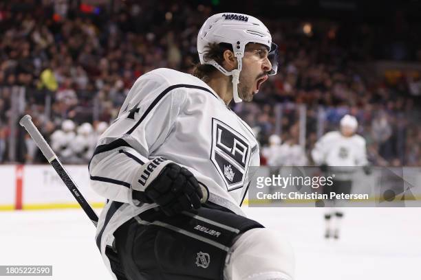 Phillip Danault of the Los Angeles Kings reacts after scoring a goal against the Arizona Coyotes during the third period of the NHL game at Mullett...