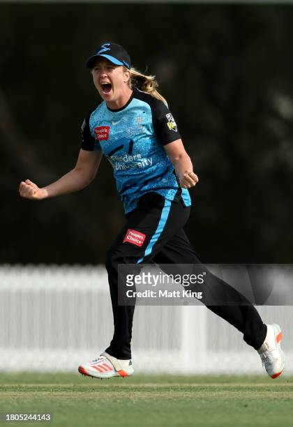 Jemma Barsby of the Strikers celebrates taking the wicket of Chamara Athapaththu of the Thunder during the WBBL match between Sydney Thunder and...