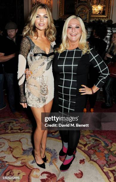 Abbey Clancy and Vanessa Feltz attend the front row for the Julien Macdonald runway show during London Fashion Week SS14 at Goldsmith's Hall on...
