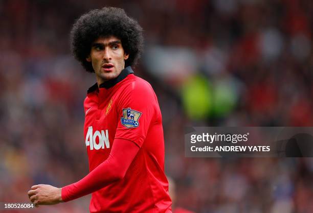 Manchester United's Belgium midfielder Marouane Fellaini looks on during the English Premier League football match between Manchester United and...