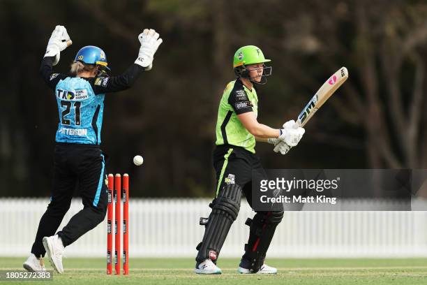 Heather Knight of the Thunder is bowled by Anesu Mushangwe of the Strikers during the WBBL match between Sydney Thunder and Adelaide Strikers at...