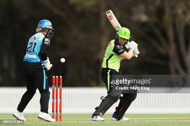 Heather Knight of the Thunder is bowled by Anesu Mushangwe of the Strikers during the WBBL match between Sydney Thunder and Adelaide Strikers at...