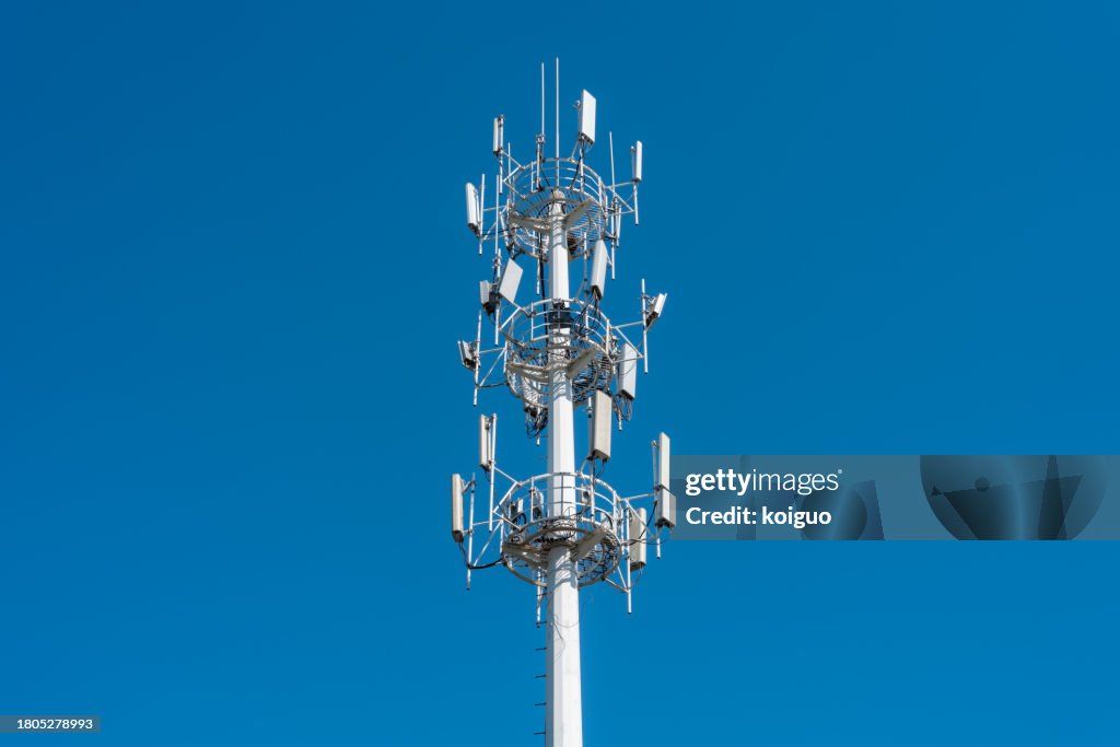 Telecom tower under blue sky