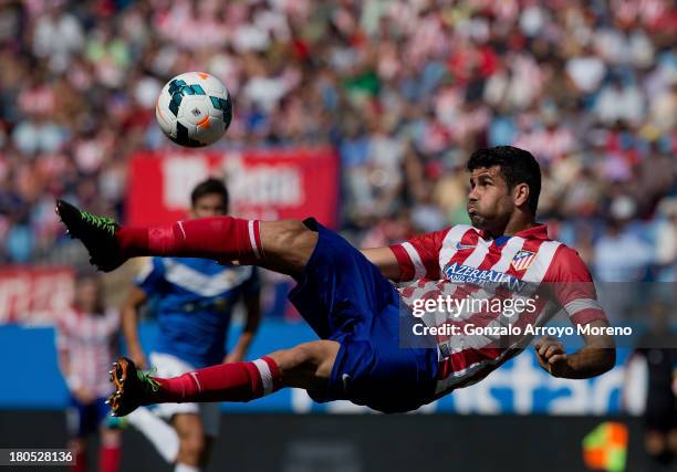 Diego Costa of Atletico de Madrid shoots during the La Liga match between Club Atletico de Madrid and UD Almeria at Vicente Calderon Stadium on...