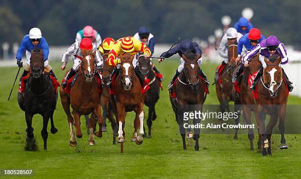 Joseph O'Brien riding Leading Light win The Ladbrokes St Leger at Doncaster racecourse on September 14, 2013 in Doncaster, England.