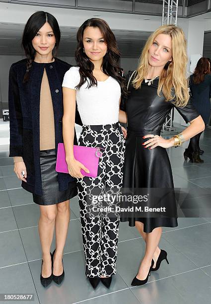 Gemma Chan, Samantha Barks and Annabelle Wallis attend the front row at the Whistles show during London Fashion Week SS14 at Heron Tower on September...