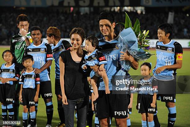 Yusuke Igawa of Kawasaki Frontale celebrates his 200th match of J.League Division1 prior to the J.League match between Kawasaki Frontale and...