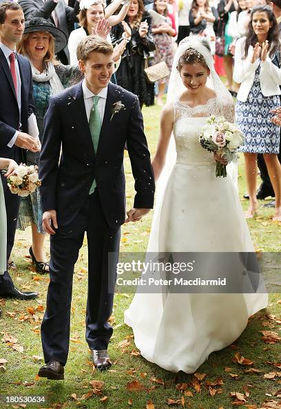 Euan Blair and his new wife Suzanne leave All Saints Church after