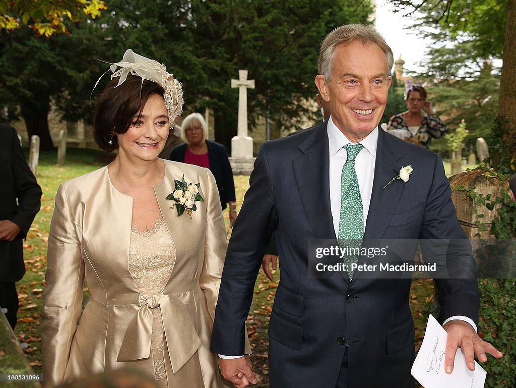Former Prime Minister Tony Blair and his wife Cherie leave All Saints