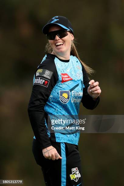 Amanda-Jade Wellington of the Strikers celebrates taking a catch to dismiss Olivia Porter of the Thunder during the WBBL match between Sydney Thunder...