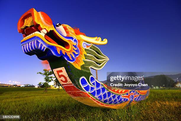 dragon boat in the night - dragon boat stock pictures, royalty-free photos & images