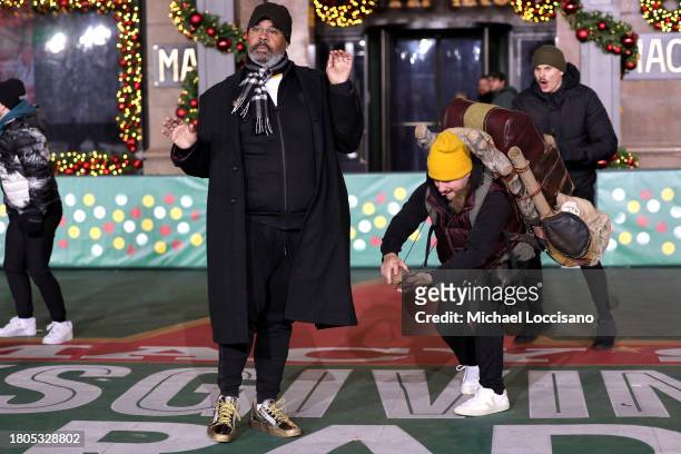 James Monroe Iglehart and Christopher Fitzgerald perform "Spamalot" during day one of 97th Macy's Thanksgiving Day Parade rehearsals at Macy's Herald...