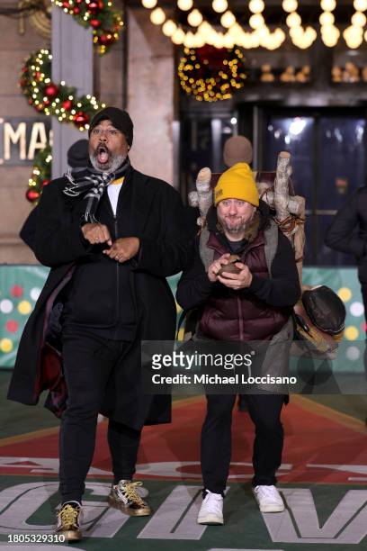 James Monroe Iglehart and Christopher Fitzgerald perform "Spamalot" during day one of 97th Macy's Thanksgiving Day Parade rehearsals at Macy's Herald...