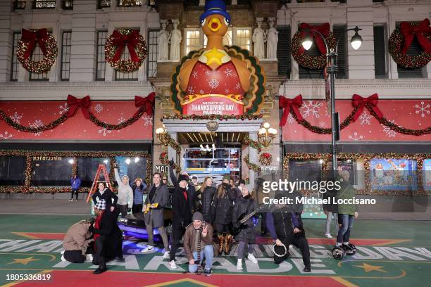The "Back to the Future: The Musical" cast perform during day one of 97th Macy's Thanksgiving Day Parade rehearsals at Macy's Herald Square on...