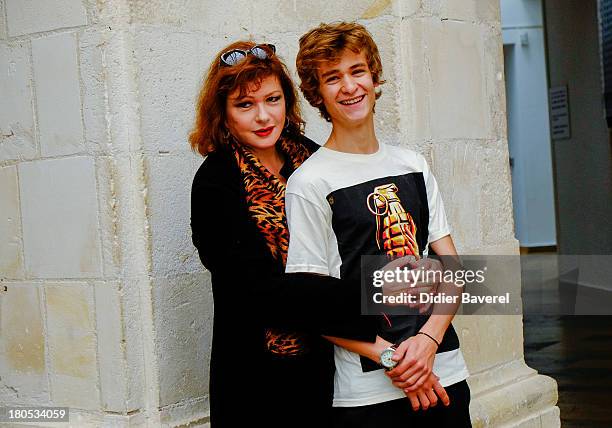 Catherine Jacob and AlexTaschino pose during the photocall of 'La Famille Katz' at 15th Festival of TV Fiction on September 14, 2013 in La Rochelle,...