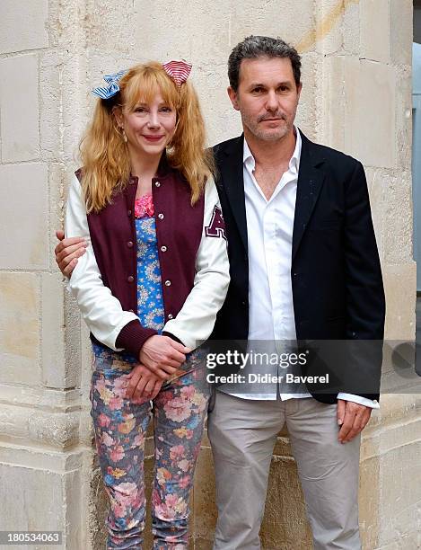 Julie Depardieu and Serge Hazavanicius pose during the photocall of 'La Famille Katz' at 15th Festival of TV Fiction on September 14, 2013 in La...