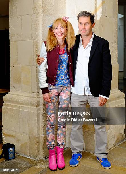 Julie Depardieu and Serge Hazavanicius pose during the photocall of 'La Famille Katz' at 15th Festival of TV Fiction on September 14, 2013 in La...