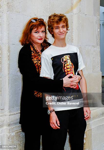 Catherine Jacob and AlexTaschino pose during the photocall of 'La Famille Katz' at 15th Festival of TV Fiction on September 14, 2013 in La Rochelle,...