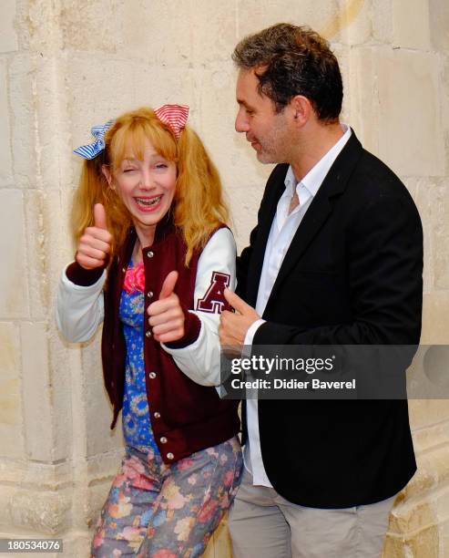 Julie Depardieu and Serge Hazavanicius pose during the photocall of 'La Famille Katz' at 15th Festival of TV Fiction on September 14, 2013 in La...