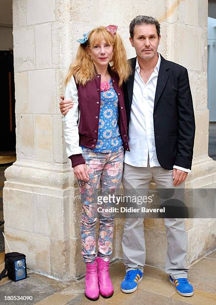 Julie Depardieu and Serge Hazavanicius pose during the photocall of 'La Famille Katz' at 15th Festival of TV Fiction on September 14, 2013 in La...