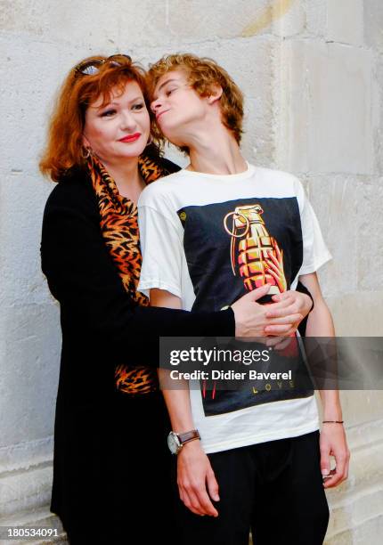 Catherine Jacob and AlexTaschino pose during the photocall of 'La Famille Katz' at 15th Festival of TV Fiction on September 14, 2013 in La Rochelle,...