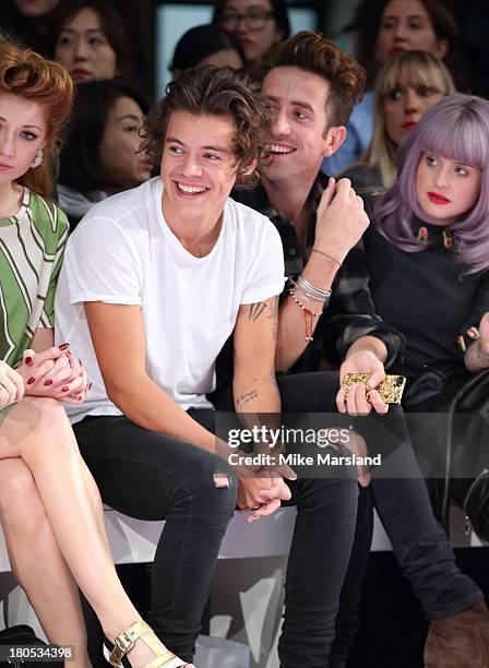 Harry Styles, Nick Grimshaw and Kelly Osbourne attend the House of Holland show at London Fashion Week SS14 on September 14, 2013 in London, England.