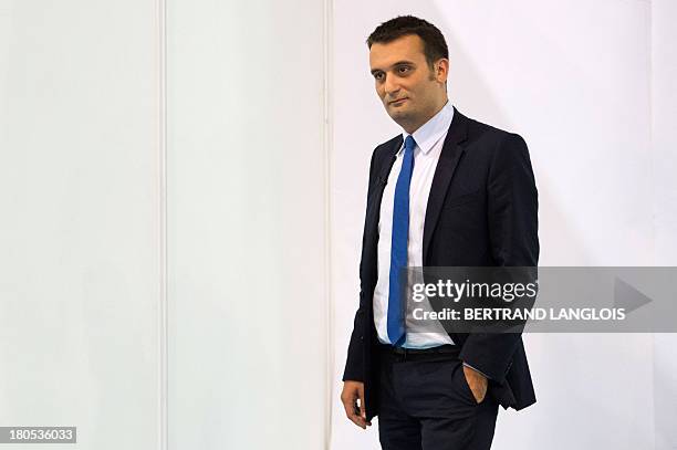 French far-right Front National party vice-President Florian Philippot poses for a photographer during the FN summer congress on September 14, 2013...