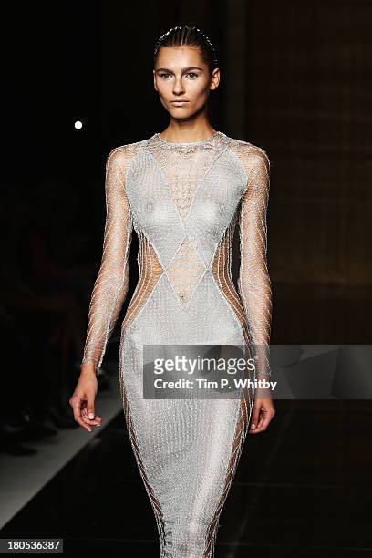 Model walks the runway at the Julien Macdonald show during London Fashion Week SS14 at Goldsmiths' Hall on September 14, 2013 in London, England.