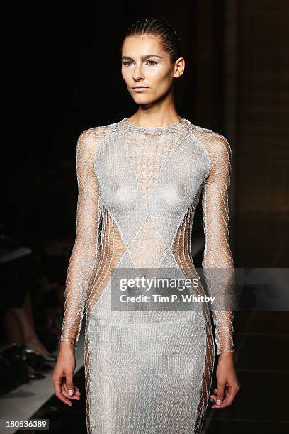 Model walks the runway at the Julien Macdonald show during London Fashion Week SS14 at Goldsmiths' Hall on September 14, 2013 in London, England.