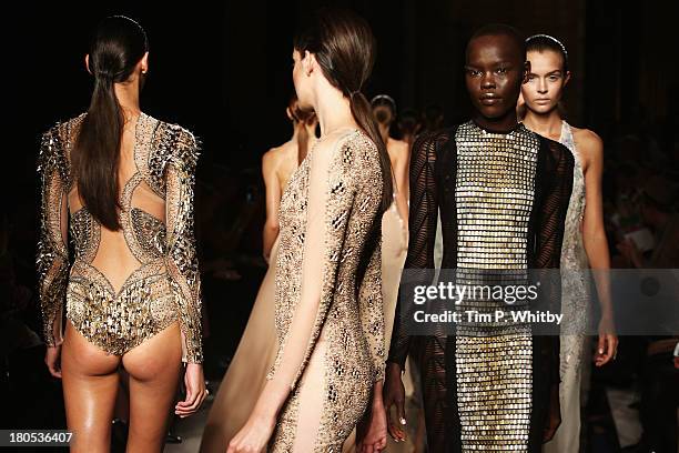 Models walk the runway at the Julien Macdonald show during London Fashion Week SS14 at Goldsmiths' Hall on September 14, 2013 in London, England.