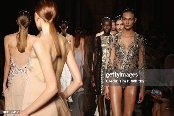 Models walk the runway at the Julien Macdonald show during London Fashion Week SS14 at Goldsmiths' Hall on September 14, 2013 in London, England.