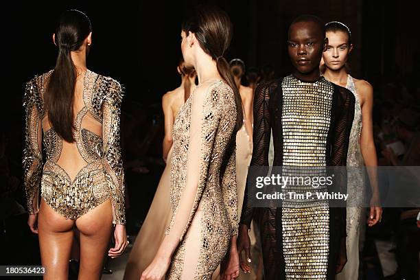 Models walk the runway at the Julien Macdonald show during London Fashion Week SS14 at Goldsmiths' Hall on September 14, 2013 in London, England.