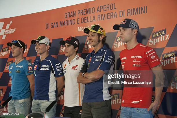 Pol Espargaro of Spain and Pons 40 HP Tuenti, Jorge Lorenzo of Spain and Yamaha Factory Racing, Marc Marquez of Spain and Repsol Honda Team,...