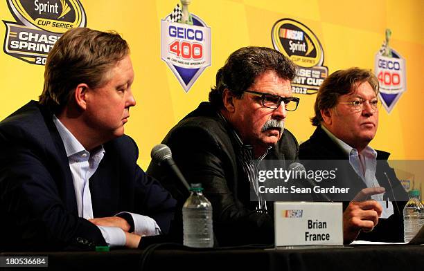 Brian France, chairman & CEO of NASCAR, Mike Helton, president of NASCAR, and Robin Pemberton, NASCAR Vice President, hold a press conference...