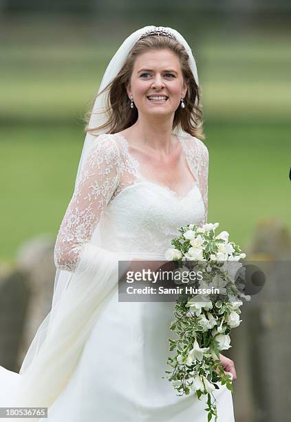 Lady Laura Marsham arrives for her wedding to James Meade at the parish church of St Nicholas in Gayton on September 14, 2013 in King's Lynn, England.