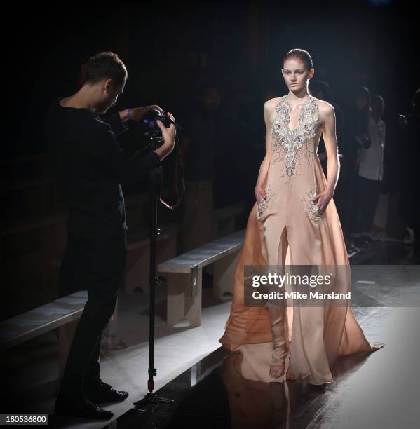 Model walks the runway at the Julien Macdonald show during London Fashion Week SS14 on September 14, 2013 in London, England.