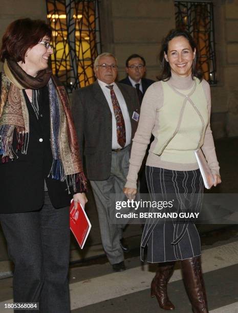 French socialist candidate in next year's presidential election Segolene Royal is on her way for a press conference, next to her press attache Agnes...