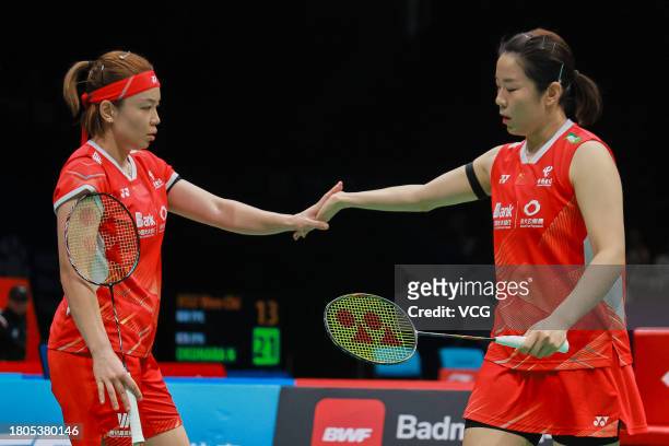 Chen Qingchen and Jia Yifan of China react in the Women's Doubles first round match against Hsu Ya-ching and Lin Wan-ching of Chinese Taipei on day...