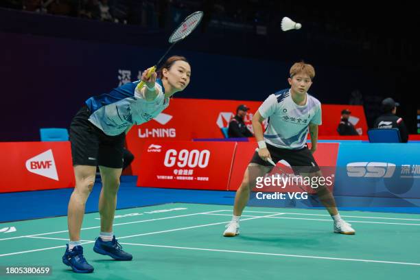 Hsu Ya-ching and Lin Wan-ching of Chinese Taipei compete in the Women's Doubles first round match against Chen Qingchen and Jia Yifan of China on day...