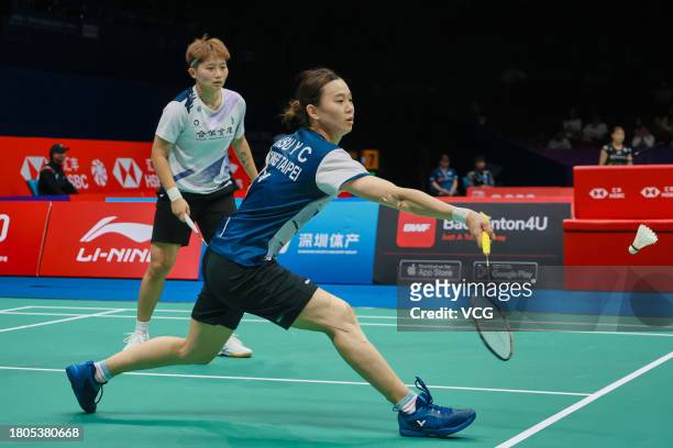 Hsu Ya-ching and Lin Wan-ching of Chinese Taipei compete in the Women's Doubles first round match against Chen Qingchen and Jia Yifan of China on day...
