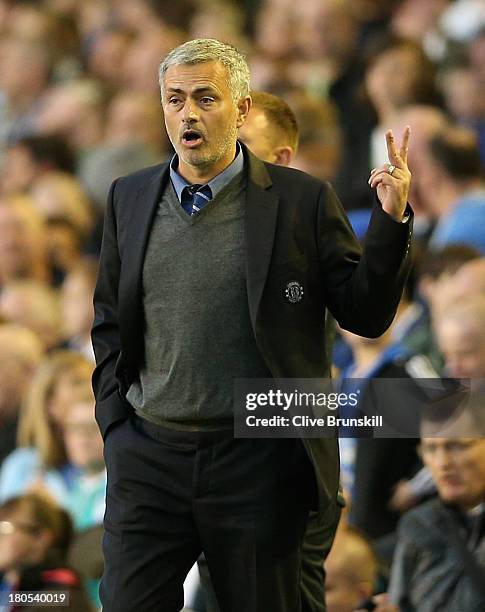 Chelsea Manager Jose Mourinho gestures during the Barclays Premier League match between Everton and Chelsea at Goodison Park on September 14, 2013 in...