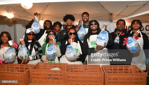 Josh Smith, Quavo and Family attend "Huncho Farms" hosted by Quavo Cares & Urban Recipe in Atlanta Community ahead of Thanksgiving on November 20,...